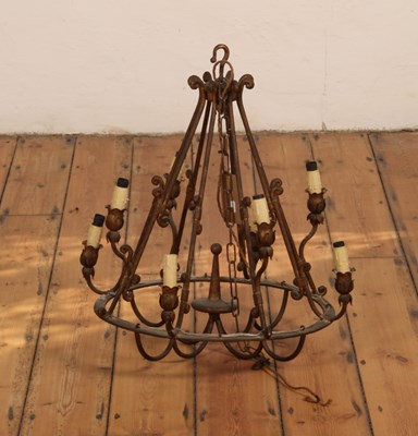 Lot 444 - A wrought iron chandelier light fitting