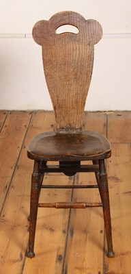 Lot 538 - An Arts & Crafts style oak chair