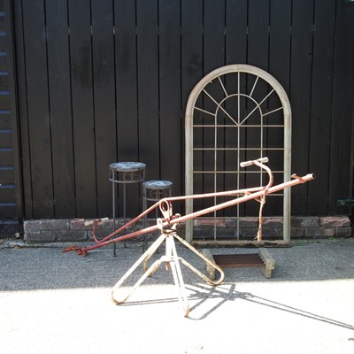 Lot 448 - A vintage childs seesaw, together with a metal...