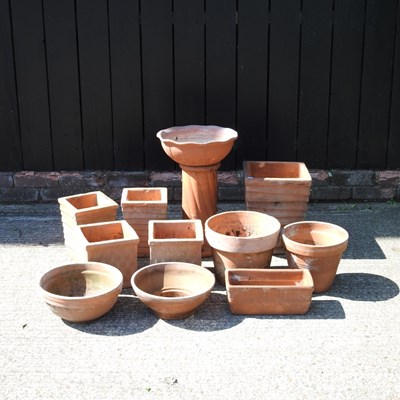 Lot 171 - A collection of terracotta garden pots,...
