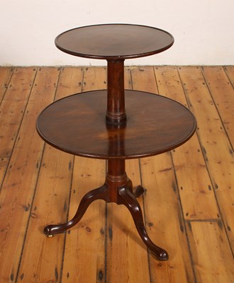 Lot 235 - A George III mahogany dumb waiter, on a gun...