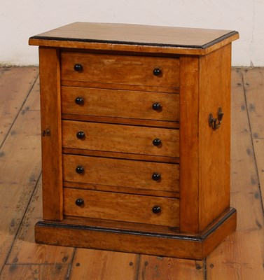 Lot 238 - A 19th century bird's eye maple Wellington...
