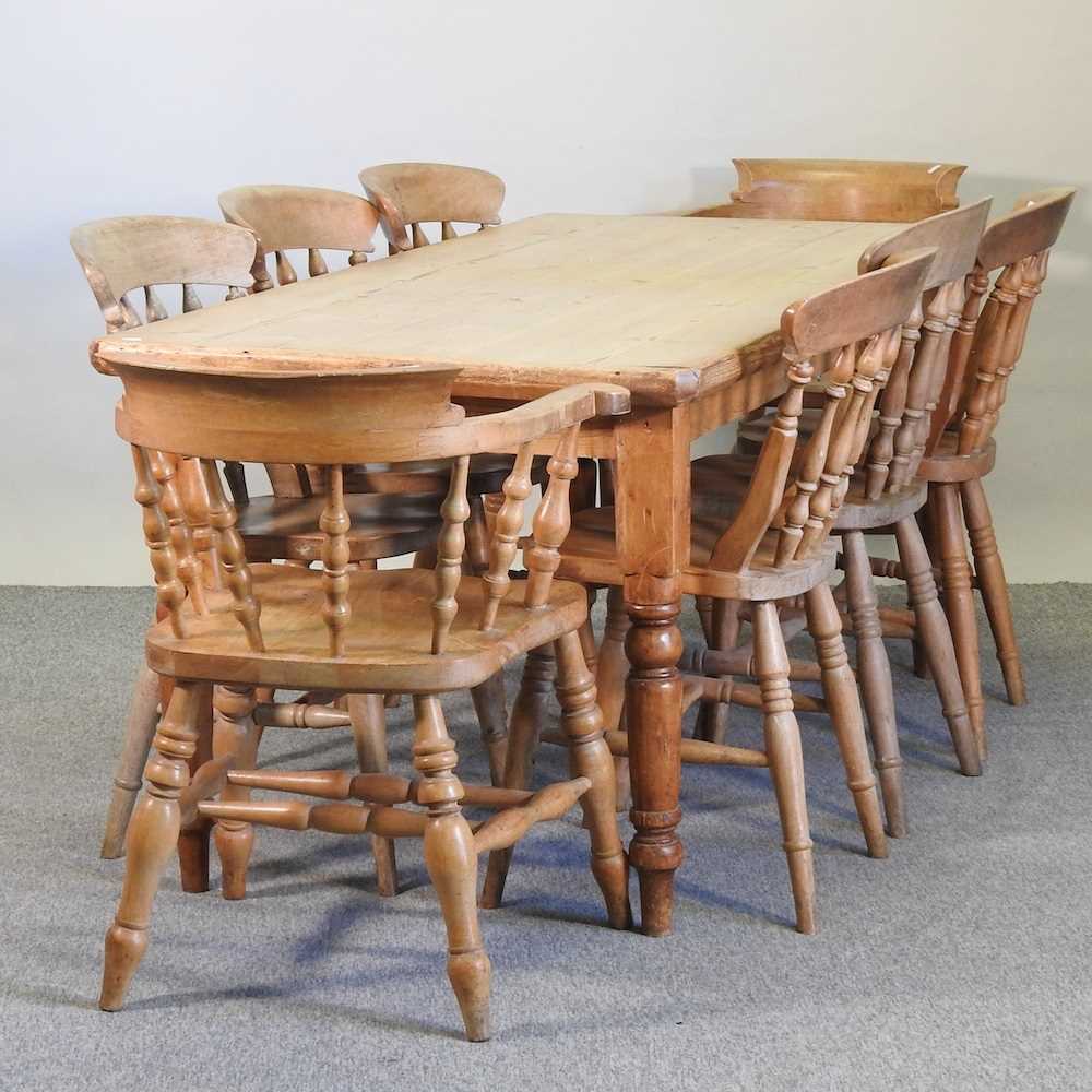 Lot 400 An antique pine dining table