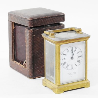 Lot 21 - An early 20th century brass cased carriage...