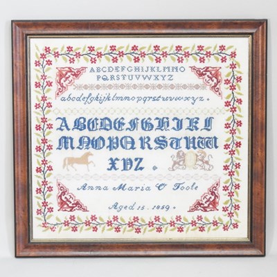 Lot 61 - A Victorian needlework sampler, worked by Anna...