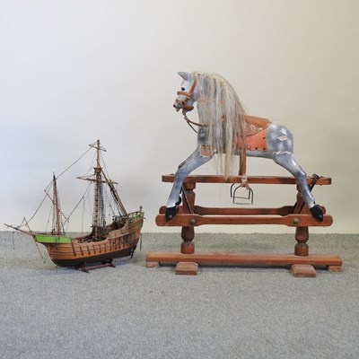 Lot 401 - A 20th century dappled grey rocking horse