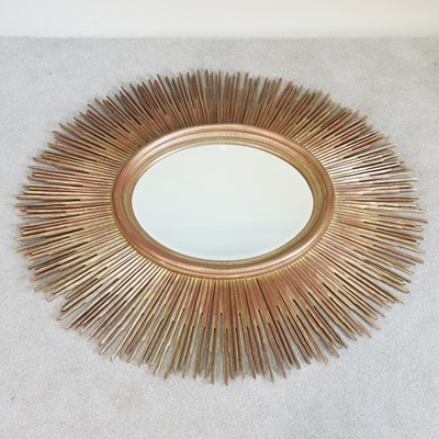 Lot 63 - An unusually large gilt wood sunburst wall...