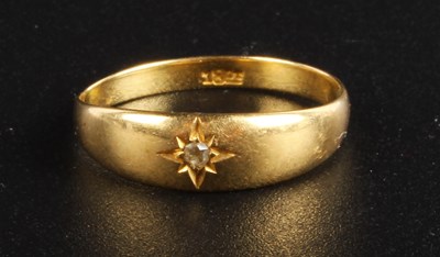 Lot 185 - An 18 carat yellow gold diamond gypsy ring,...