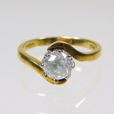 Lot 122 - An 18 carat gold diamond solitaire ring, of...