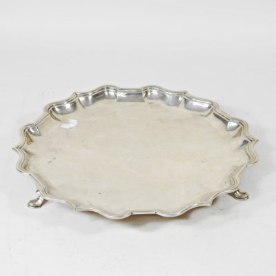 Lot 53 - An Edwardian silver salver, of circular shape,...