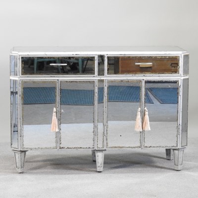 Lot 550 - A contemporary mirrored sideboard