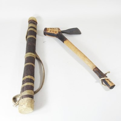 Lot 414 - A tribal axe, together with a spear carrier (2)