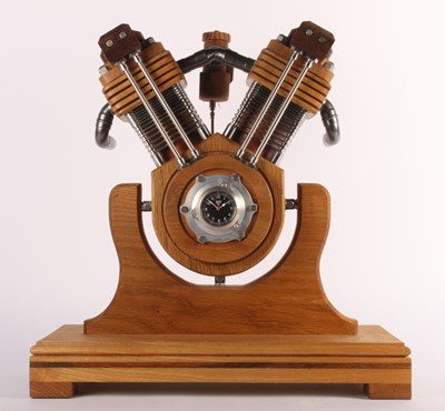 Lot 384 - A large 20th century oak mantel clock in the...