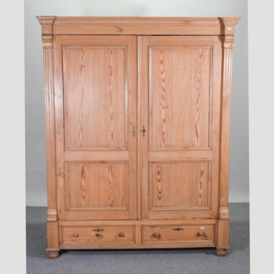 Lot 404 - A continental antique pine armoire