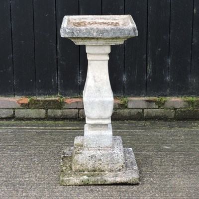 Lot 321 - A reconstituted stone bird bath