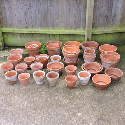 Lot 311 - A large collection of terracotta garden pots