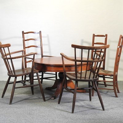 Lot 616 - A reproduction hardwood drum table