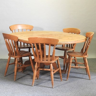 Lot 410 - A modern pine oval extending dining table