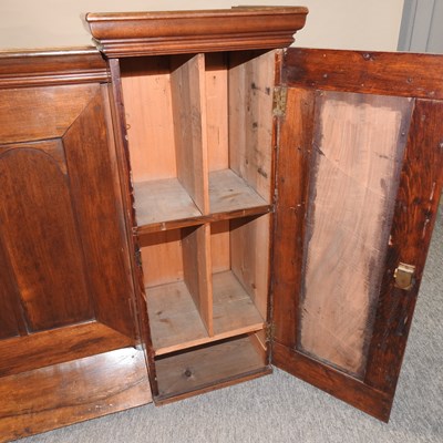 Lot 415 - An antique fruitwood cabinet