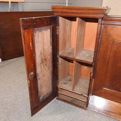 Lot 415 - An antique fruitwood cabinet