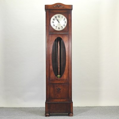 Lot 620 - A 1930's oak cased longcase clock