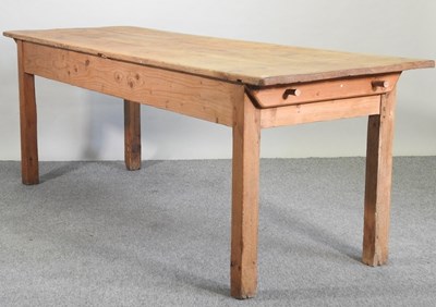 Lot 412 - An antique pine dining table