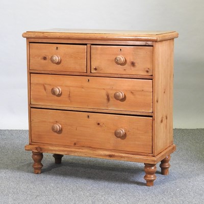 Lot 413 - An early 20th century pine chest of drawers