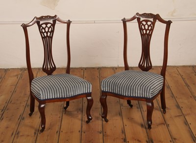 Lot 626 - A pair of Edwardian mahogany low chairs with...