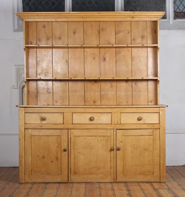 Lot 340 - A pine dresser of large proportions, having...