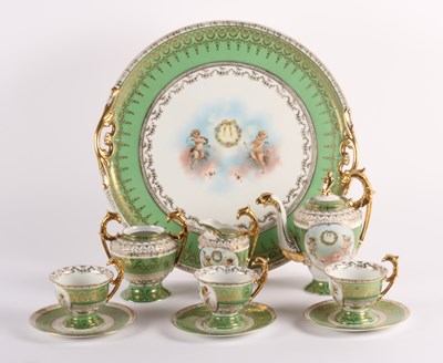 Lot 422 - A continental gilt and green porcelain three...