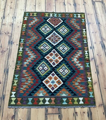 Lot 673 - A Maimana kilim rug, of colourful geometric...