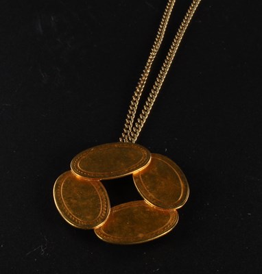 Lot 117 - An 18 carat yellow gold pendant, 6g, on a...