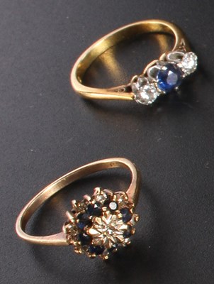 Lot 234 - An 18 carat yellow gold sapphire and diamond...