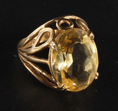 Lot 21 - A 9 carat yellow gold citrine ring, size N, 5.1g