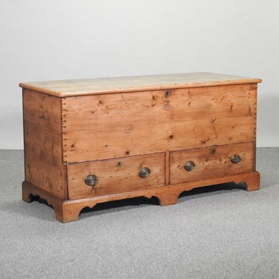 Lot 416 - A 19th century stripped pine mule chest