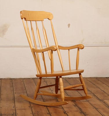 Lot 471 - A beech stick back rocking chair