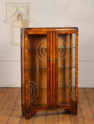 Lot 711 - An Art Deco walnut display cabinet