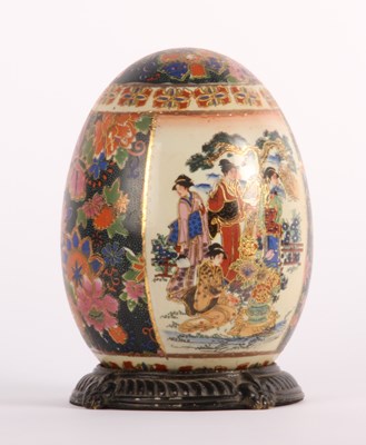 Lot 587 - A Japanese Satsuma egg on stand