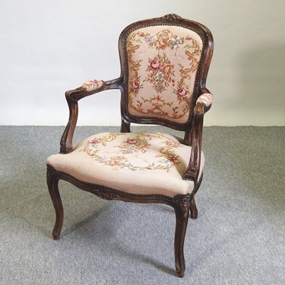 Lot 645 - A French style open armchair