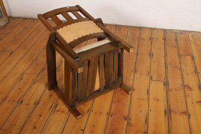 Lot 18 - An Arts & Crafts Mission style oak armchair,...