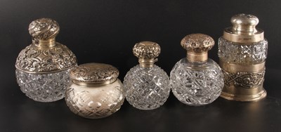 Lot 367 - A collection of silver topped and mounted cut...