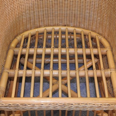 Lot 87 - A 20th century wicker rocking chair