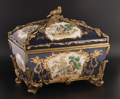 Lot 273 - A large gilt metal mounted porcelain table...