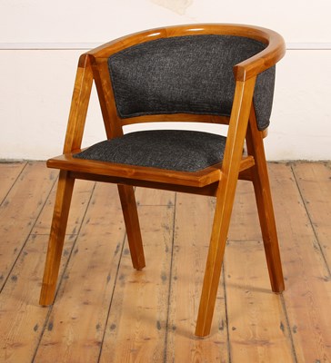Lot 548 - A modern teak armchair, of angular outline
