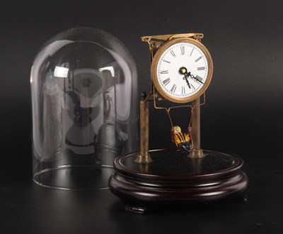 Lot 420 - A mantel clock, the enamel dial showing Roman...