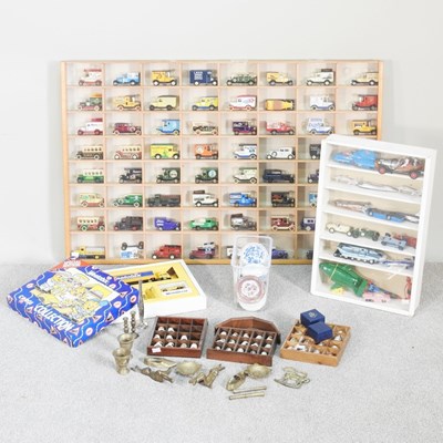 Lot 324 - A collection of diecast model cars, in a...