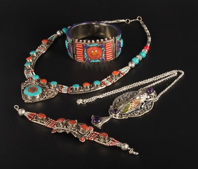 Lot 153 - A Tibetan style bangle, bracelet and necklace,...