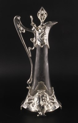 Lot 302 - An Art Nouveau style glass claret jug, with...