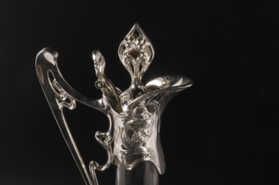 Lot 302 - An Art Nouveau style glass claret jug, with...