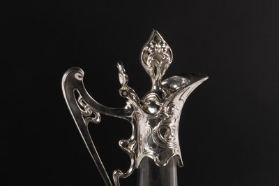 Lot 302 - An Art Nouveau style glass claret jug, with...